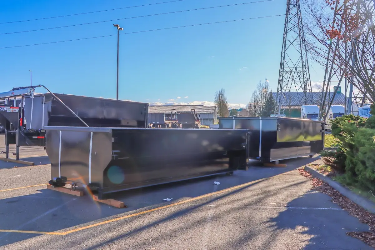 Roll-off dumpster ready for waste disposal at job site for 2 Yard Dumpster Rental in Lockwood